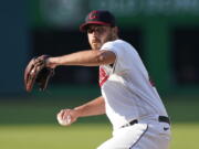 Cleveland Indians starting pitcher Aaron Civale delivers in the first inning of the team's baseball game against the Seattle Mariners, Friday, June 11, 2021, in Cleveland.