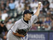 Seattle Mariners starting pitcher Yusei Kikuchi, of Japan, throws against the Chicago White Sox during the first inning of a baseball game in Chicago, Friday, June 25, 2021. (AP Photo/Nam Y.