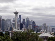 FILE - This July 23, 2020, file photo shows the view of the Space Needle, in Seattle. Record-high heat is forecast in the Pacific Northwest this weekend, raising concerns about wildfires and the health of people in a region where many don't have air conditioning. The National Weather Service has issued an Excessive Heat Watch and predicted "dangerously hot" conditions Friday, June 25, 2021, through at least Tuesday.