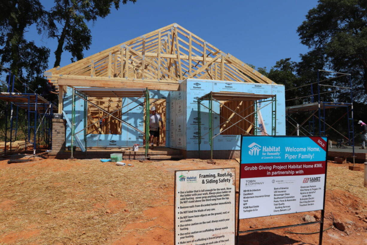 In this photo provided by Habitat for Humanity of Greenville County, a home is constructed by Habitat for Humanity on Sept. 12, 2019, in Greenville, S.C. Reeling from massive cutbacks in volunteers during the COVID-19 pandemic, and grappling with high construction costs, Habitat for Humanity affiliates would be the first to admit they're struggling.