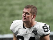 FILE - In this Nov. 29, 2020, file photo, Las Vegas Raiders defensive end Carl Nassib leaves the field after an NFL football game against the Atlanta Falcons in Atlanta. Nassib on Monday, June 21, 2021, became the first active NFL player to come out as gay.