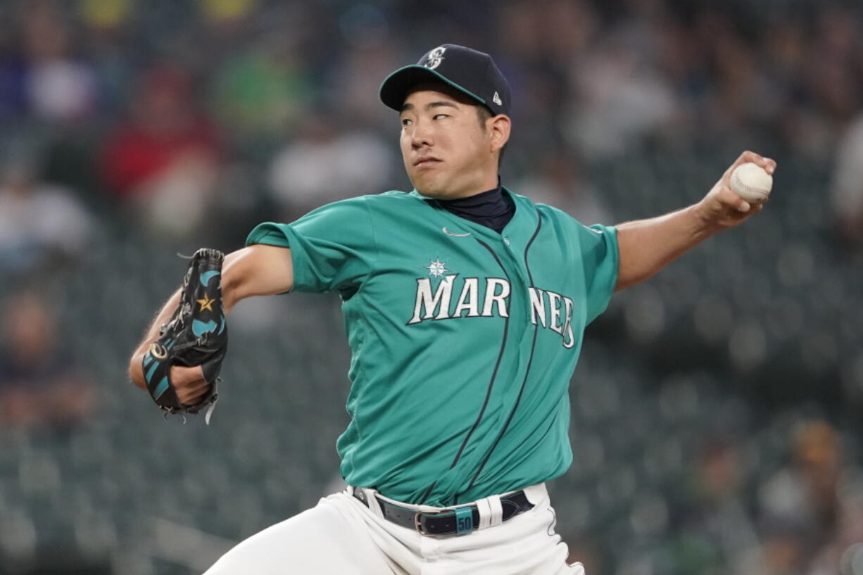 Seattle Mariners starting pitcher Yusei Kikuchi throws to a Tampa Bay Rays batter during the sixth inning of a baseball game Friday, June 18, 2021, in Seattle. (AP Photo/Ted S.