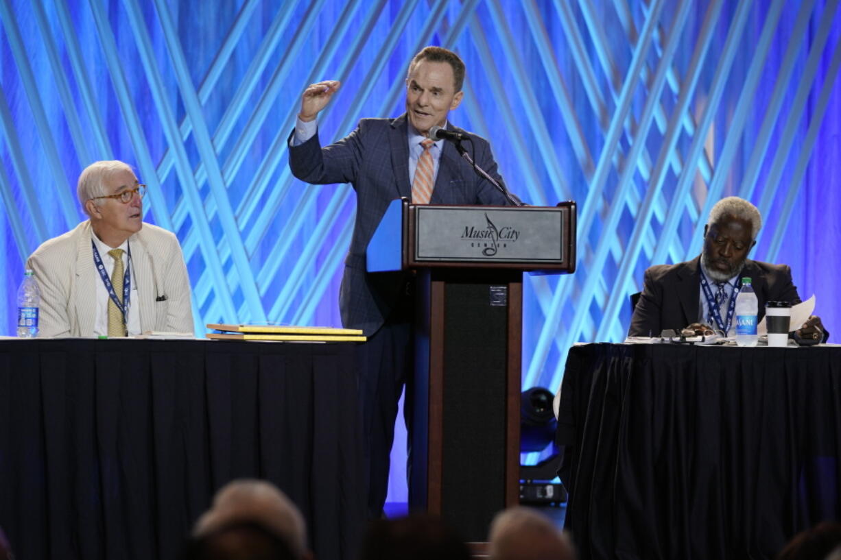 Dr. Ronnie Floyd, center, president and CEO of the executive committee of the Southern Baptist Convention, speaks during the executive committee plenary meeting at the denomination's annual meeting Monday, June 14, 2021, in Nashville, Tenn.