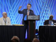 Dr. Ronnie Floyd, center, president and CEO of the executive committee of the Southern Baptist Convention, speaks during the executive committee plenary meeting at the denomination's annual meeting Monday, June 14, 2021, in Nashville, Tenn.