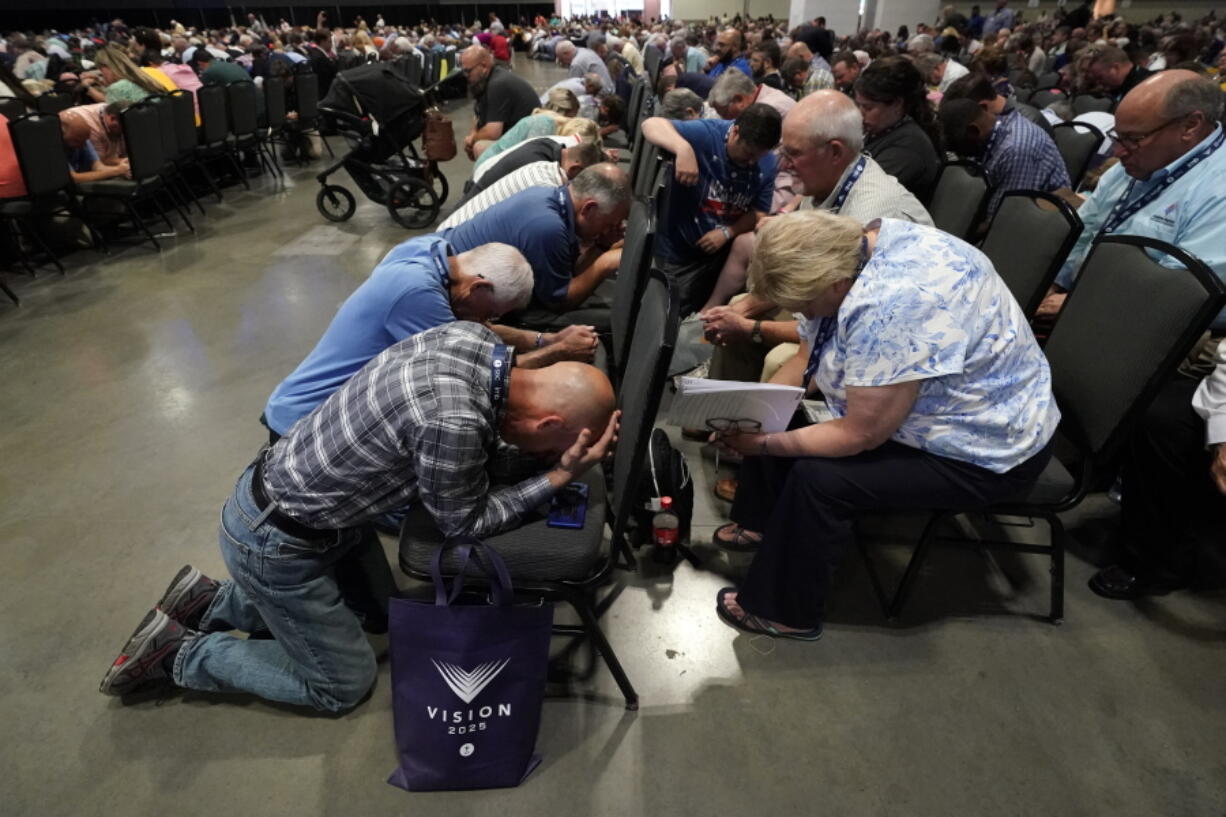 Votes are collected on the first ballot for president of the Southern Baptist Convention during the denomination's annual meeting Tuesday, June 15, 2021, in Nashville, Tenn.