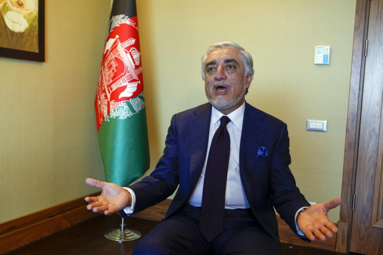 Abdullah Abdullah, head of Afghanistan's National Reconciliation Council, gestures as he talks to The Associated Press following an interview on the sidelines of a diplomatic forum in Antalya, Turkey, Friday, June 18, 2021. Abdullah expressed concerns hat the Taliban will have no interest in a political settlement with the U.S.-supported government in Kabul following the departure of U.S. and NATO forces. By Sept. 11 at the latest, around 2,300-3,500 remaining U.S. troops and roughly 7,000 allied NATO forces are scheduled to leave Afghanistan,, ending nearly 20 years of military engagement.