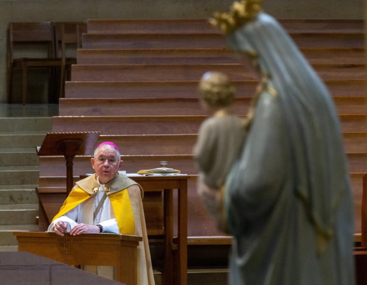 f FILE - In this May 1, 2020, file photo, Archbishop Jose H. Gomez leads a livesteam service at an empty Cathedral of Our Lady of the Angels in Los Angeles. In a May 22, 2021 memo, Gomez confirmed that the issue of whether or not to press ahead with an initiative that could -- at least implicitly - rebuke President Joe Biden for receiving Communion while supporting abortion rights, would be on the national meeting's agenda.