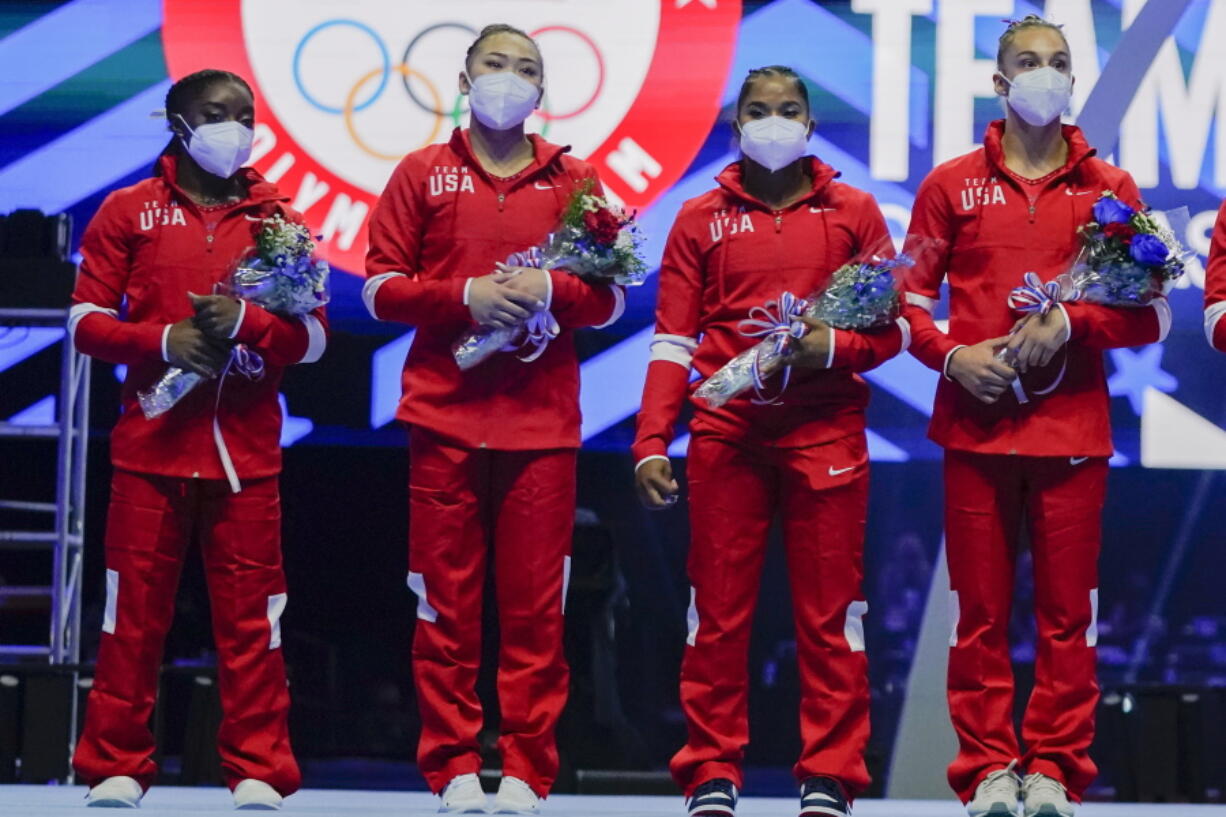 Members of the U.S. Women's Olympic Gymnastic Team, Simone Biles, Suni Lee, Jordan Chiles and Grace McCallum (L-R) are announced after the U.S. Olympic Gymnastics Trials Sunday, June 27, 2021, in St. Louis.