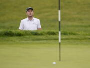 Russell Henley watches his shot on the first green roll wide of the cup during the first round of the U.S. Open Golf Championship, Thursday, June 17, 2021, at Torrey Pines Golf Course in San Diego.