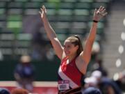 Kara Winger celebrates during the qualifying round for women's javelin throw at the U.S. Olympic Track and Field Trials Friday, June 25, 2021, in Eugene, Ore.