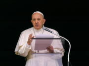 FILE - In this June 6, 2021 file photo, Pope Francis speaks from the window of his studio overlooking St. Peter's Square at the Vatican to a crowd of faithful and pilgrims gathered for the Sunday Angelus noon prayer. On Wednesday, June 30, 2021 Canada's Catholic bishops said Pope Francis has agreed to meet in December with Indigenous survivors of the country's notorious residential schools amid calls for a papal apology for Catholic Church's role in the abuse and deaths of thousands of native children.