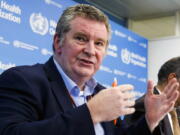 FILE - In this Wednesday, Feb. 5, 2020 file photo, Dr. Michael Ryan, executive director of the World Health Organization's Health Emergencies program, speaks during a news conference at the WHO headquarters in Geneva, Switzerland.  Top World Health Organization official Dr. Michael Ryan, said Monday June 7, 2021, he estimates that worldwide COVID-19 vaccination coverage of over 80% is needed to significantly lower the chance that an imported coronavirus case could spawn a cluster or a wider outbreak.