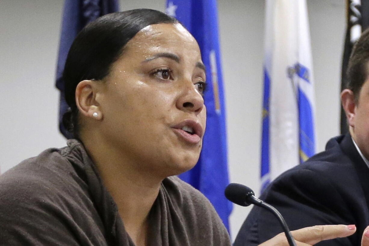 In this June 26, 2018, file photo, then-Suffolk County District Attorney Democratic candidate Rachael Rollins in Boston. Rollins, now Suffolk County District Attorney, said recently that she will urge the Supreme Judicial Court to follow Washington State and rule that those youth offenders must get a special sentencing hearing to consider their age before punishments can be handed down, especially in life without parole sentences.