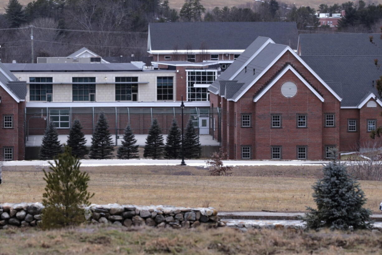 FILE - In this Jan. 28, 2020, file photo is the Sununu Youth Services Center in Manchester, N.H. As states from California to Maine consider drastic changes to youth detention centers, New Hampshire is grappling with its own facility that has been rocked by abuse allegations from years past. The state's Legislature will vote Thursday on a proposed state budget that would close the sprawling facility -- housing fewer than 20 children on a campus built for 144 -- by March 2023 and replace it with a new 18-bed center.