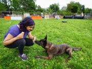 Amritha Mallikarjun trains with Lucy, a cancer-detecting dog, at the Penn Vet Working Dog Center in Philadelphia.