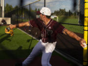 Ridgefield Raptors pitcher Nick Nygard warms up during a West Coast League game at Ridgefield Outdoor Recreation Complex. Nygard says a new grip on his slider is one factor in his success this summer.