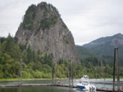 A fisherman casts his reel into the Columbia River from the dock at the Doetsch day-use area at Beacon Rock State Park.