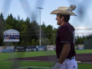 Ridgefield's Kody Darcy pretends to use a lasso while putting on a home run hat after clearing the center-field fence in the second inning in a West Coast League baseball game on Tuesday, June 8, 2021, at the Ridgefield Outdoor Recreation Complex. Ridgefield won 6-3 to improve to 4-0 on the season.