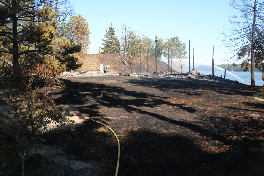 The site of a June 28 fire that burned down a vacant home and the surrounding brush. The cause of the fire is officially undetermined, although the Vancouver Fire Marshal's Office determined the fire started on the exterior of the house.