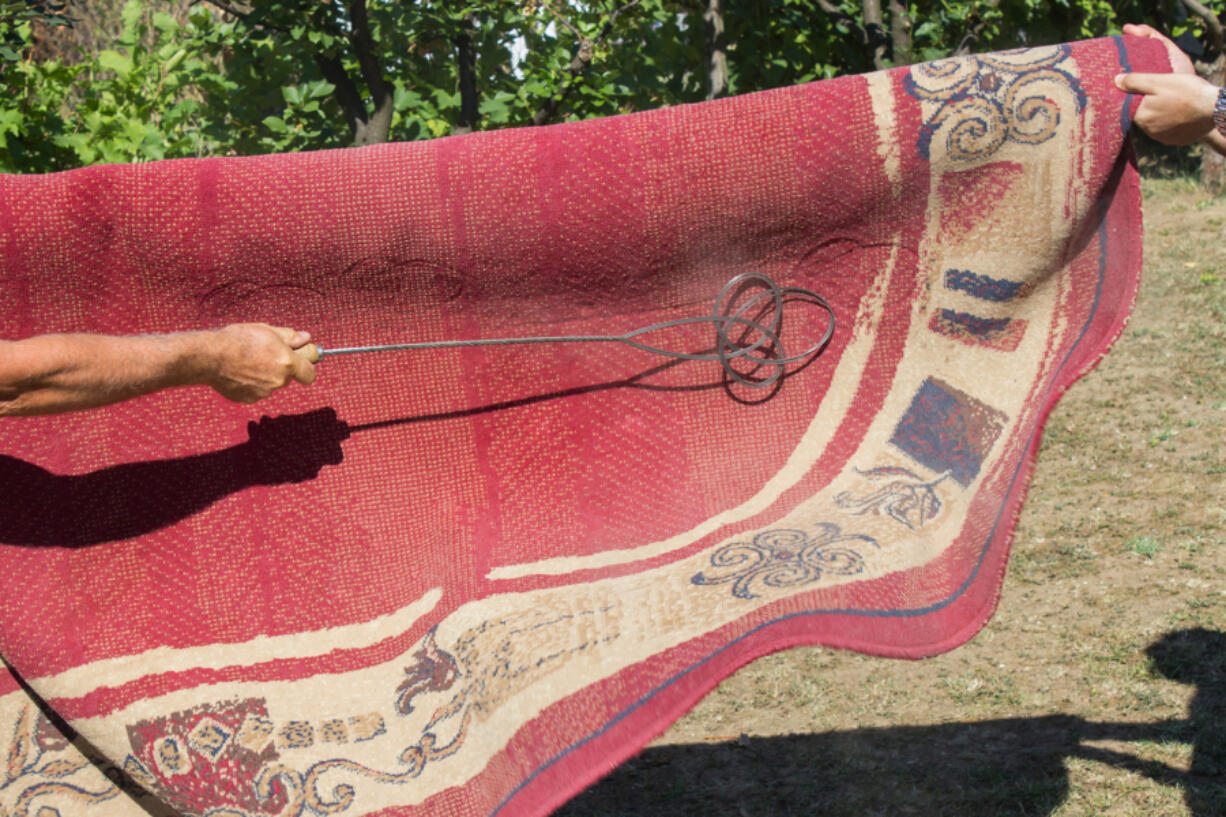 The old-fashioned method of rug beating is actually an effective tool for reducing indoor pollen and dust.