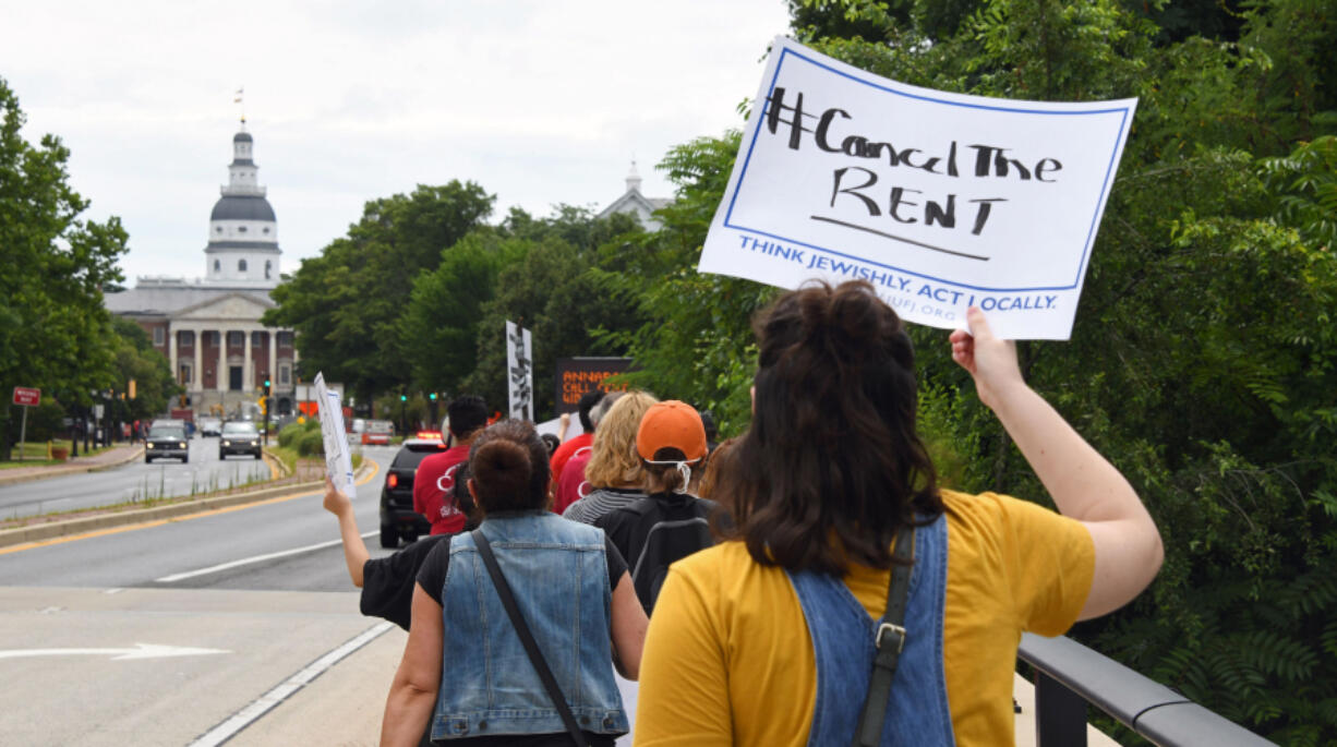 Tenants and advocates march from Annapolis District Court to the Governor's Mansion to urge Gov. Larry Hogan to protect renters in Maryland from eviction in June 2020.