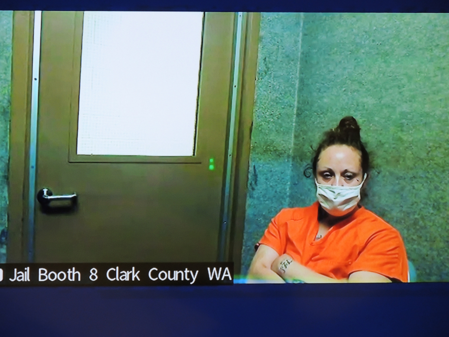 Misty Raya, 35, makes a first appearance in Clark County Superior Court on July 26, 2021, on a warrant in a June burglary case. Clark County Prosecutor Tony Golik said the weapon used to fatally shoot sheriff's Detective Jeremy Brown was one of 27 stolen in the burglary.