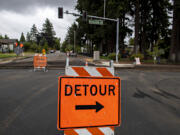 Crews work to repave Columbia Street in Vancouver's Carter Park neighborhood in 2021.