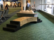 VANCOUVER: A bridge, seen in the foreground, and a boat in the background, both made of Indian granite and Italian marble by artist Larry Kirkland, will be moved from their longtime home at the Portland International Airport later this summer.