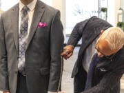 VAN MALL: Glen Johnson gets measured for new clothing with menswear designer David Ambrico at the Big Reveal event at Vancouver Mall.