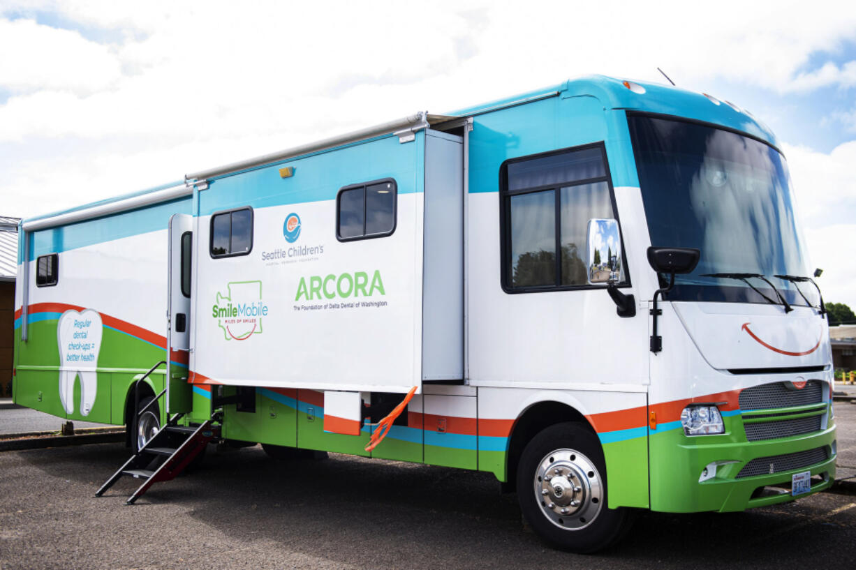 The SmileMobile, a mobile dental van that offers dental services to people who have trouble accessing dental care, is parked at the Cowlitz Indian Tribal Health Clinic in Longview.