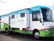 The SmileMobile, a mobile dental van that offers dental services to people who have trouble accessing dental care, is parked at the Cowlitz Indian Tribal Health Clinic in Longview.