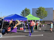 VAN MALL: Relay for Life of Clark County volunteers held a Parking in the Parking Lot Tailgate event at Vancouver Mall on July 17 to help raise funds for cancer research and patient services.