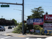 Signs for the upcoming primary election are seen along Northeast 18th Street on Thursday afternoon.