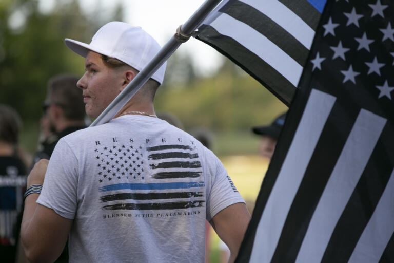 Andrew Trosko, 14, arrives for the Memorial Mile run/walk in honor of Detective Jeremy Brown at Alki Middle School on Wednesday, July 28, 2021. "If I can be out here for 30 minutes to honor him, I'm going to do that," Trosko said.