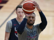 Damian Lillard shoots during practice for USA Basketball, Wednesday, July 7, 2021, in Las Vegas.