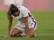 United States' Tobin Heath reacts after losing 3-0 against Sweden during a women's soccer match at the 2020 Summer Olympics, Wednesday, July 21, 2021, in Tokyo.