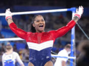 Jordan Chiles, of the United States, celebrates her performance on the uneven bars during the artistic gymnastics women's final at the 2020 Summer Olympics, Tuesday, July 27, 2021, in Tokyo.