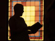 A member of Waldoboro United Methodist Church sings a hymn during a service, Sunday, June 20, 2021, in Waldoboro, Maine. The drop in attendance at the church, in part due to COVID-19, forced its closure. The last sermon was on June 27. (AP Photo/Robert F. Bukaty) (Robert F.