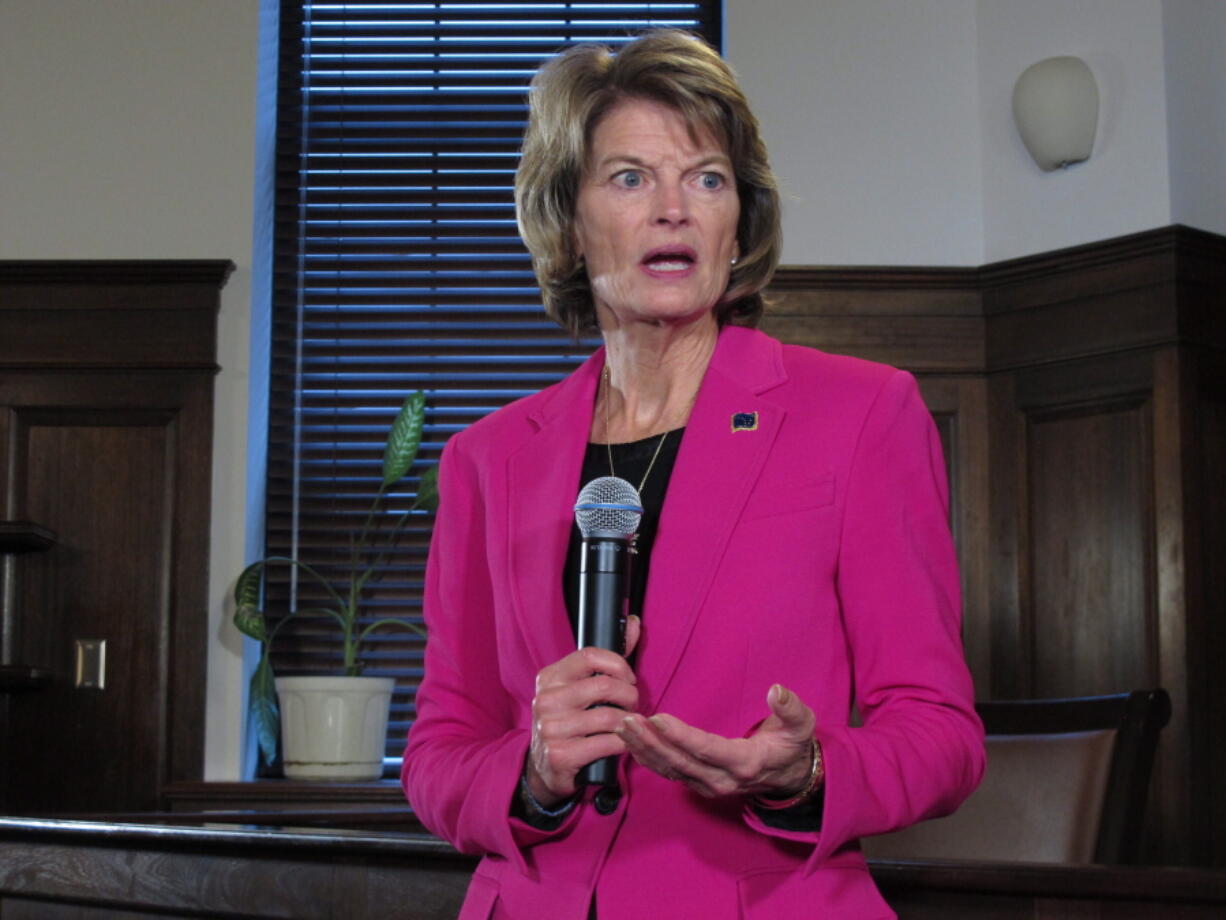 FILE - In this Feb. 18, 2020, photo, U.S. Sen. Lisa Murkowski speaks with reporters in Juneau, Alaska. The leaders of Alaska's Republican Party on Saturday, July 10, 2021 endorsed a challenger to incumbent U.S. Sen. Lisa Murkowski, who has been one of the GOP's most outspoken critics of former President Donald Trump, the Anchorage Daily News reported. The Alaska Republican State Central Committee endorsed Kelly Tshibaka in the 2022 race for the U.S. Senate seat held by Murkowski.