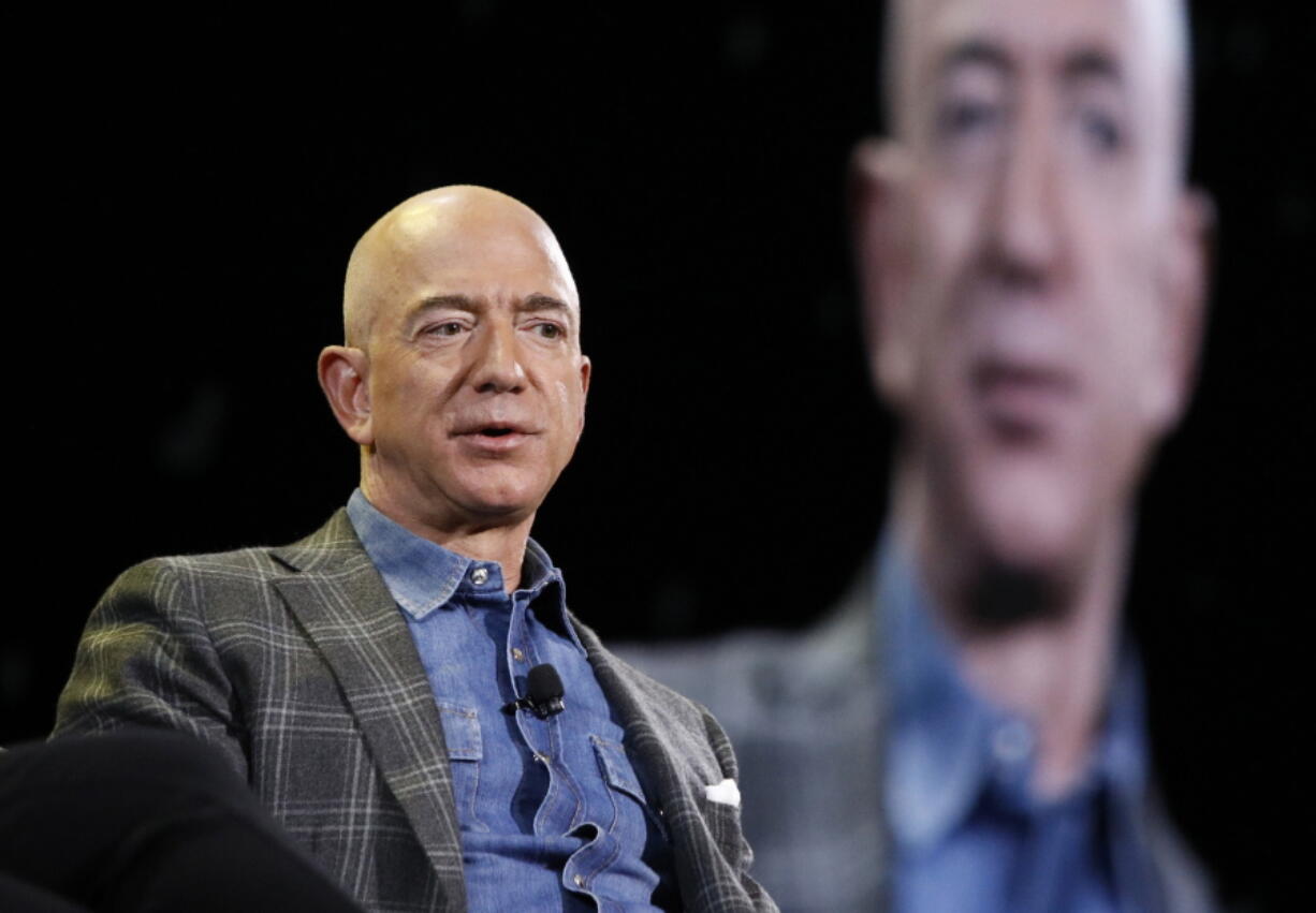 FILE - In this June 6, 2019, file photo Amazon CEO Jeff Bezos speaks at the the Amazon re:MARS convention in Las Vegas.  The Amazon founder officially stepped down as CEO on Monday, July 5, 2021, handing over the reins as the company navigates the challenges of a world fighting to emerge from the coronavirus pandemic. Andy Jassy, the head of Amazon's cloud-computing business, replaced Bezos, a change the company had announced in February.