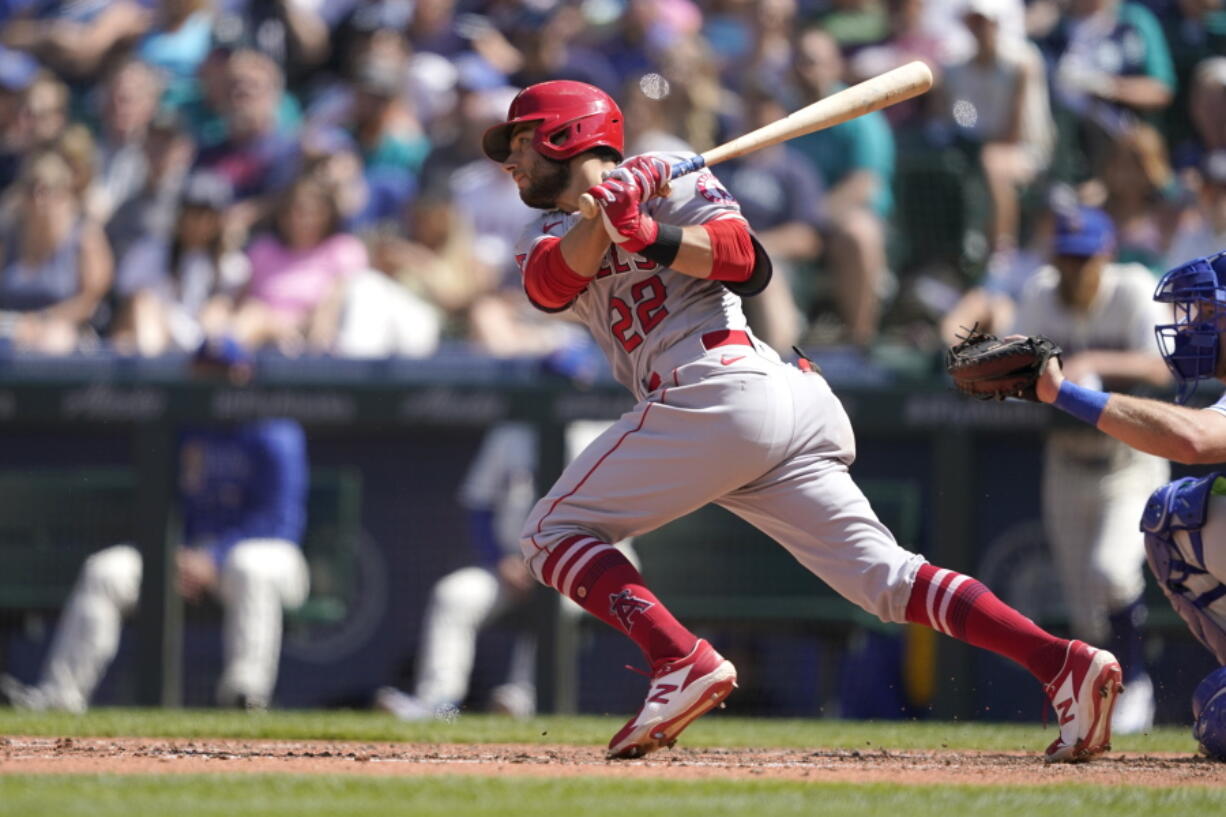 Los Angeles Angels' David Fletcher hits an RBI single in the seventh inning. The second baseman went 4 for 5, pushing his season batting average to .309. (Ted S.