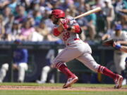 Los Angeles Angels' David Fletcher hits an RBI single in the seventh inning. The second baseman went 4 for 5, pushing his season batting average to .309. (Ted S.