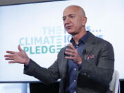 FILE - This Sept. 19, 2019, file photo shows Jeff Bezos speaking at the National Press Club in Washington. The Smithsonian Institution announced July 14, 2021, that Bezos, founder of Amazon and space-flight company Blue Origin, is donating $200 million to the National Air and Space Museum.