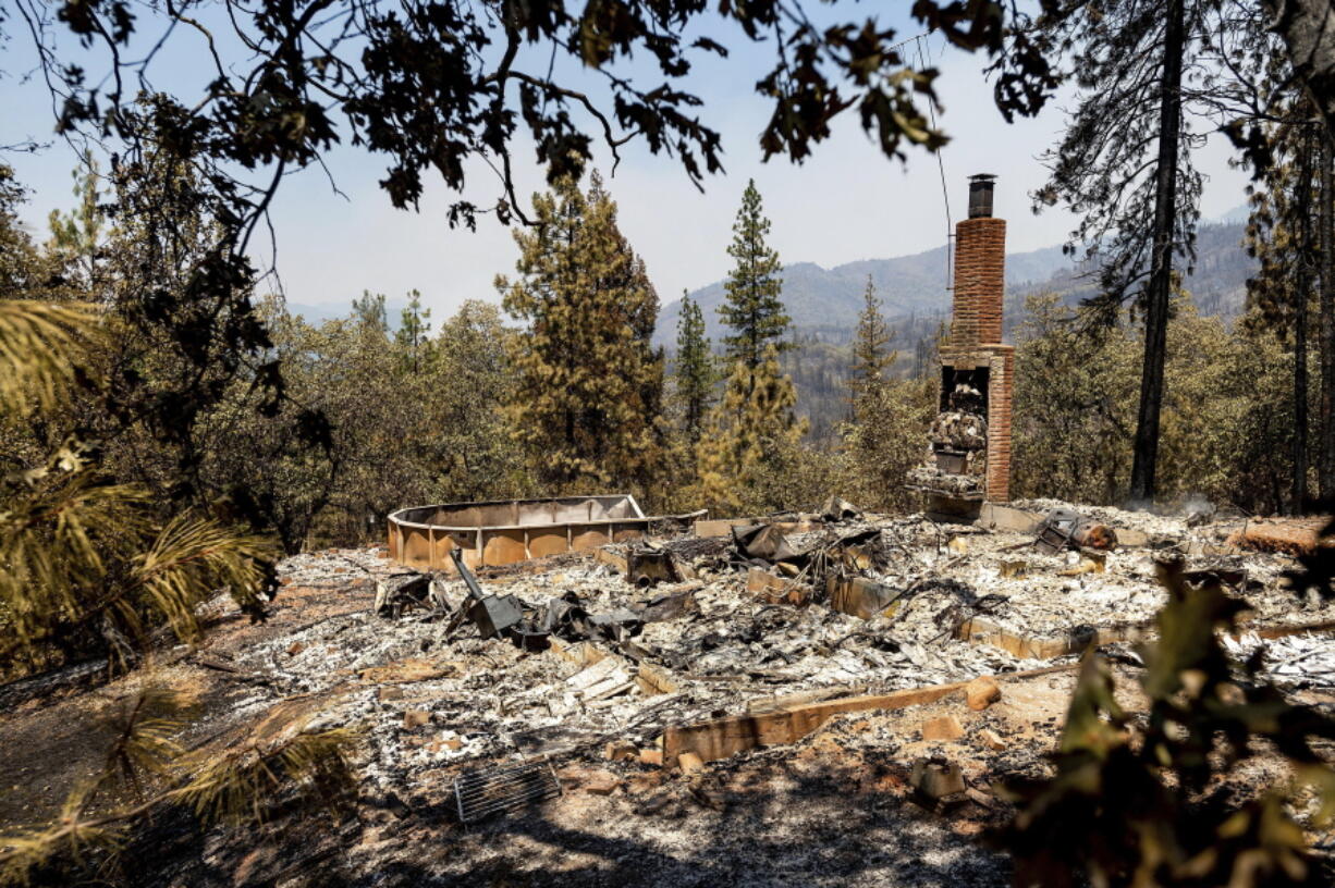 A Gregory Creek-area home reduced to rubble by the Salt Fire is seen Friday in unincorporated Shasta County, Calif.