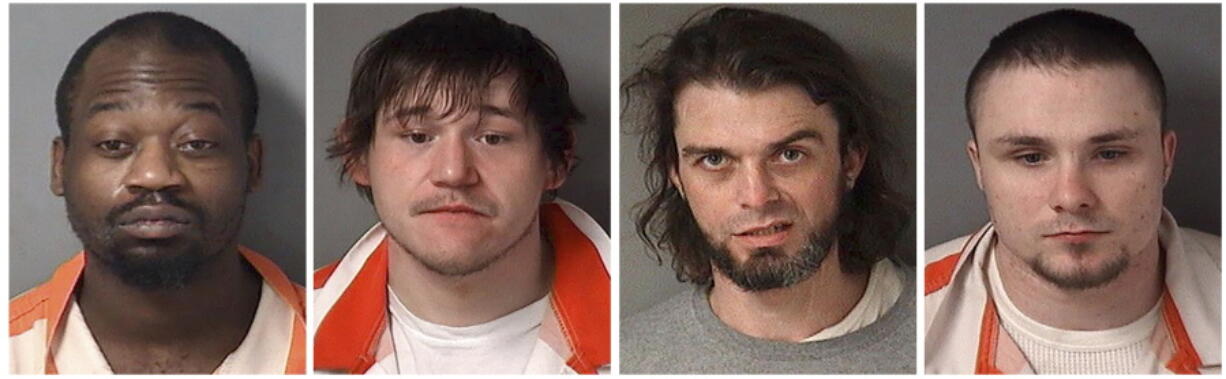 These undated photos provided by the Fulton County Sheriff's Department in Lewistown, Ill., shows, from left, Jesse Davis, 35, Cody Villalobos, 26, Zachary Hart, 36, and Eugene Roets, 23. The four inmates escaped from the Fulton County Jail in Lewistown on Wednesday, July 7, 2021. Authorities didn't immediately say how the men escaped, but said they should be considered armed and dangerous.