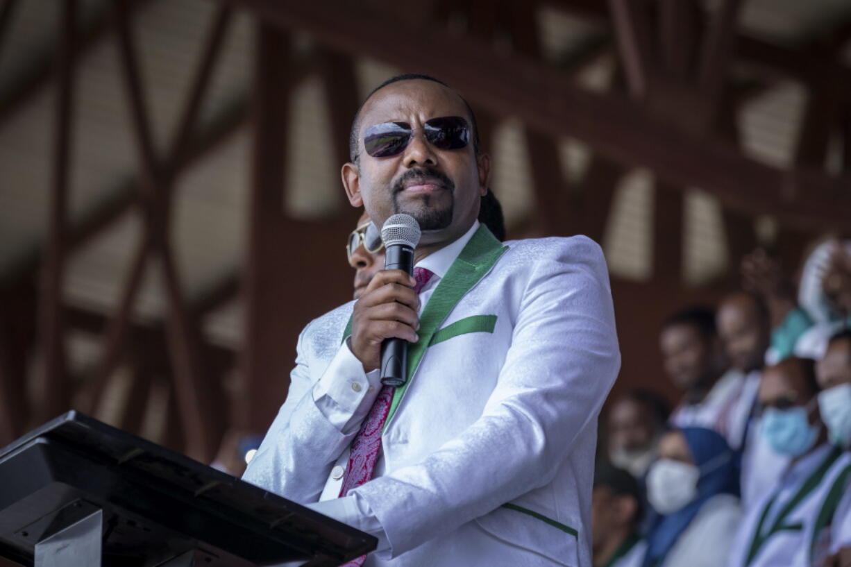 FILE - In this Wednesday, June 16, 2021 file photo, Ethiopia's Prime Minister Abiy Ahmed speaks at a final campaign rally at a stadium in the town of Jimma in the southwestern Oromia Region of Ethiopia. Ethiopia's ruling Prosperity Party was declared on Saturday, July 10, 2021 the winner of last month's national election in a landslide, assuring a second term for Prime Minister Abiy Ahmed.