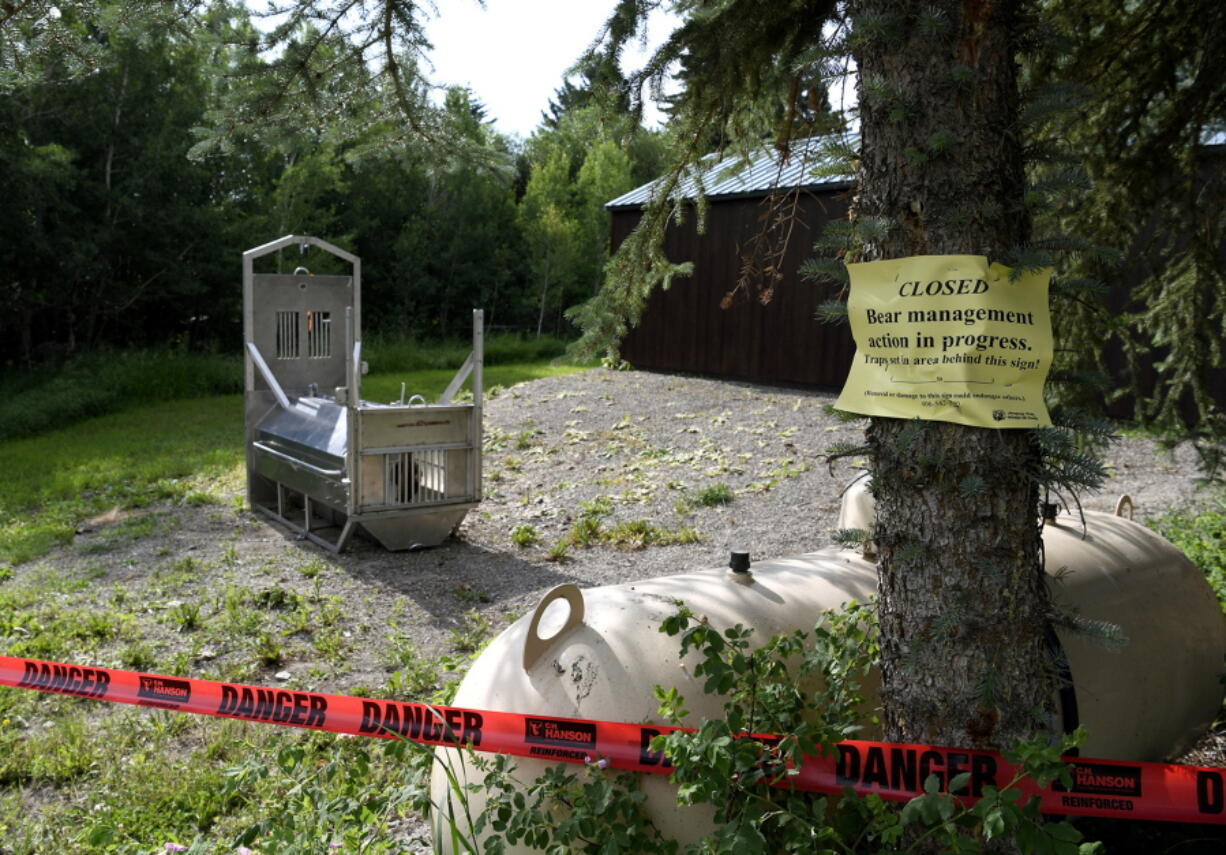 A bear trap set by Montana Fish, Wildlife and Parks sets Wednesday, July 7, 2021, in the camping area in Ovando, Mont., where bicycle tourist Leah Davis Lokan of Chico, California, was pulled out of her tent and killed by a grizzly bear early Tuesday.