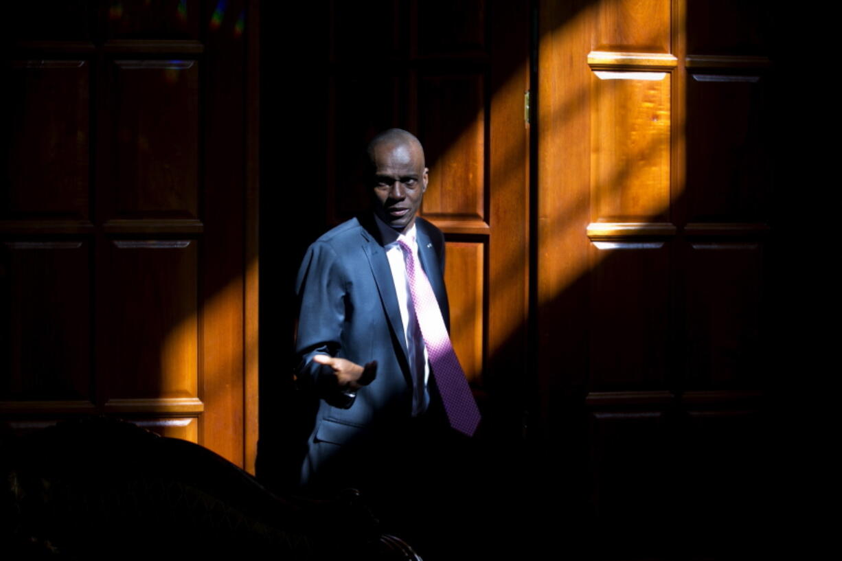 FILE - In this Feb. 7, 2020 file photo, Haitian President Jovenel Moise arrives for an interview at his home in Petion-Ville, a suburb of Port-au-Prince, Haiti. Mo?se was assassinated in an attack on his private residence early Wednesday, July 7, 2021, and First Lady Martine Mo?se was shot in the overnight attack and hospitalized, according to a statement from the country's interim prime minister.