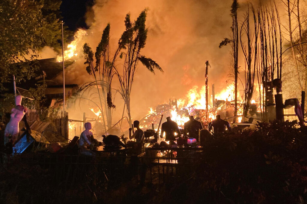 A fire near Battle Ground at the site of a historic church may have been caused by fireworks, according to Clark-Cowlitz Fire Rescue.