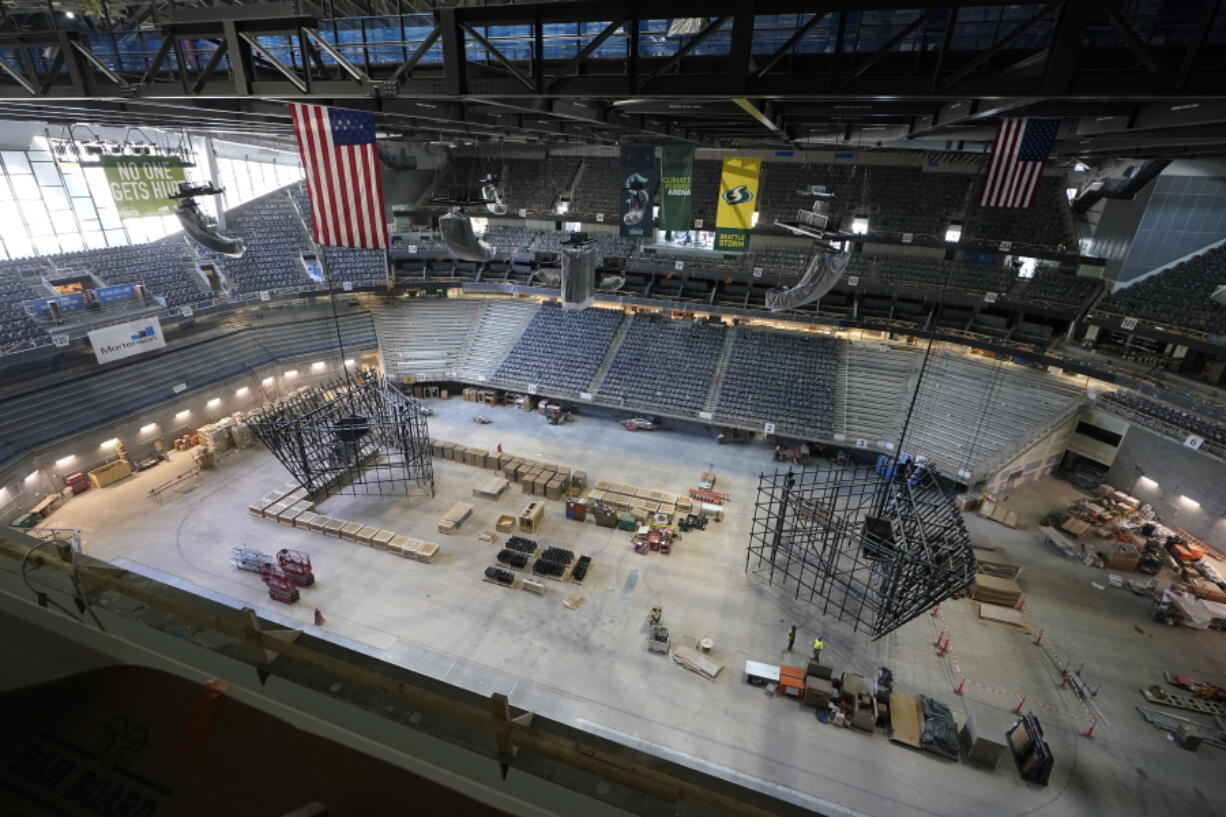 The ice and seating areas of Climate Pledge Arena are viewed during a media tour of the facility, Monday, July 12, 2021, in Seattle. The arena will be the home of the NHL hockey team Seattle Kraken and the WNBA Seattle Storm basketball team as well as hosting concerts and other performing arts events. (AP Photo/Ted S.